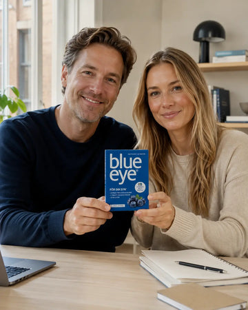Man and woman jointly holding Elexir BlueEye during a screen break