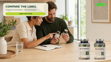 Adults comparing Elexir Multi Female and Multi Man labels at a Scandinavian kitchen table.